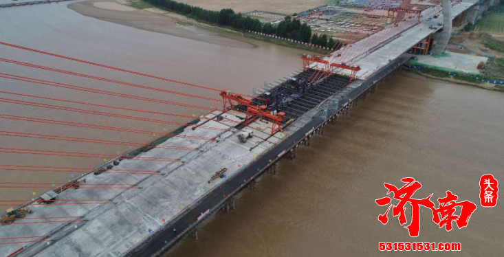 中交二公局承建的济南齐鲁黄河大桥主桥420米跨拱肋顺利合龙 项目如期完工打下了坚实的基础